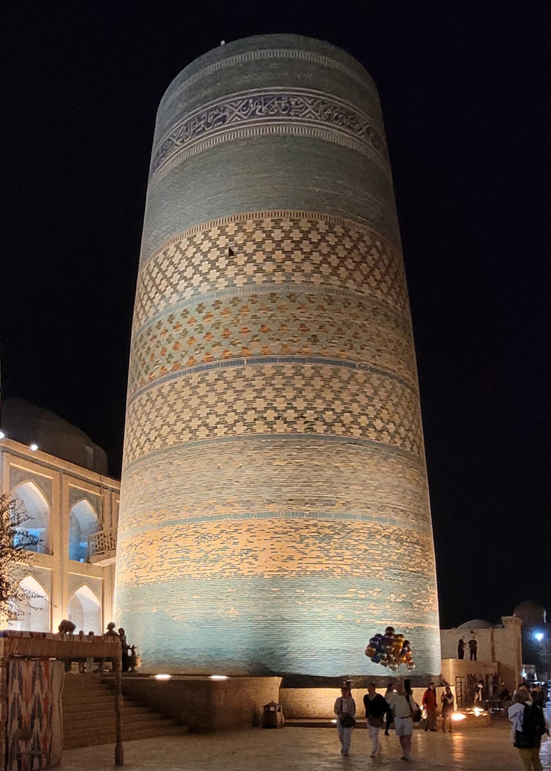 Kalta Minor minaret lit up at night, Khiva